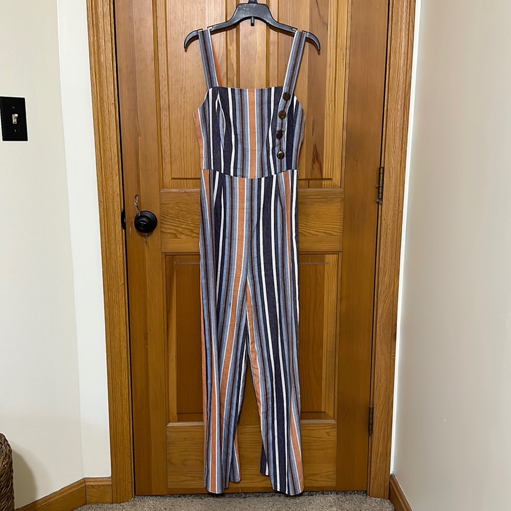 Size 1, worn once Fishbowl romper. Multicolor striped pattern with buttons.